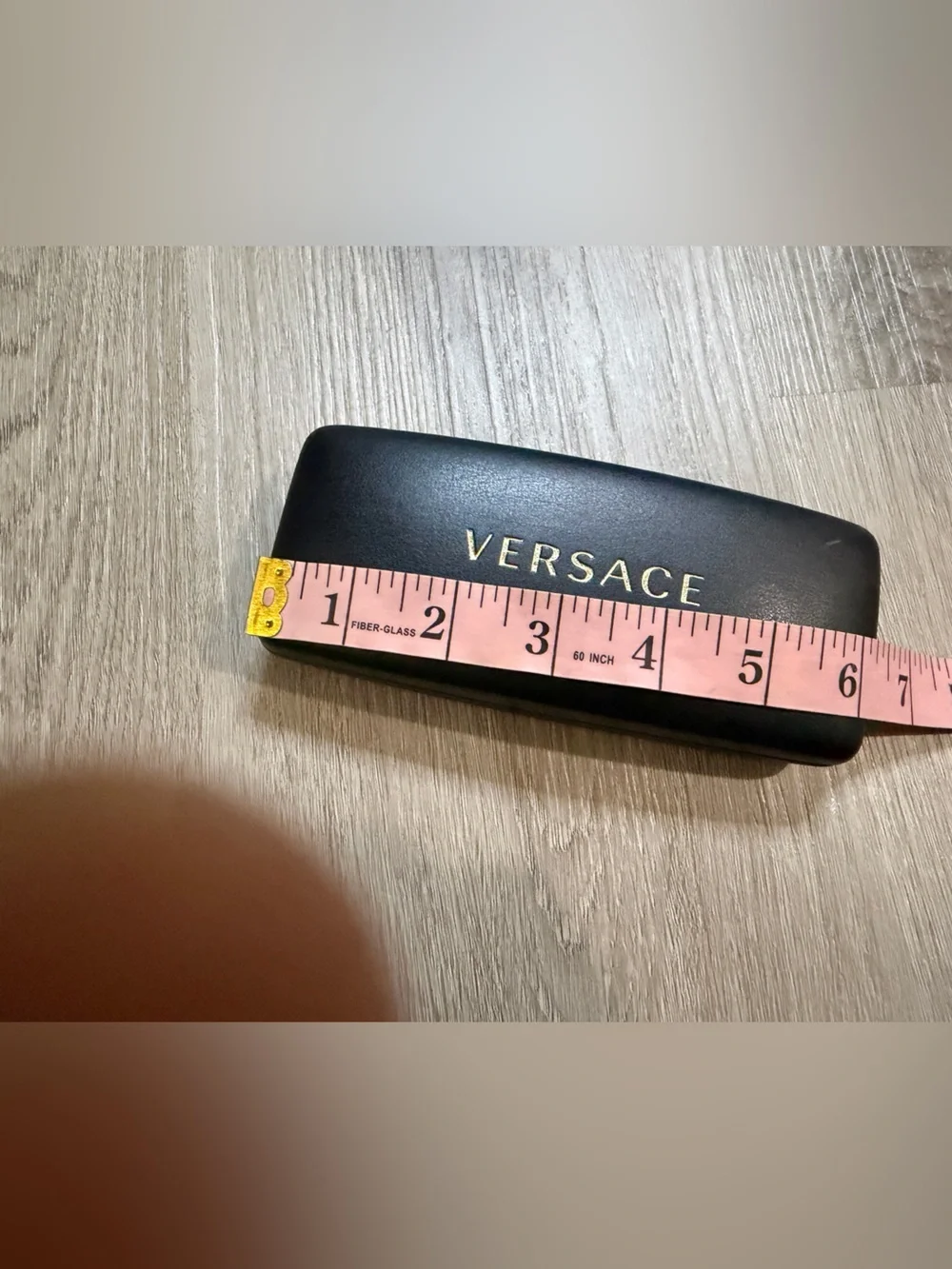 Versace Black Case with Gold Lettering
